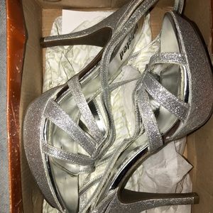 Unlisted by Kenneth Cole- silver heels size 10M